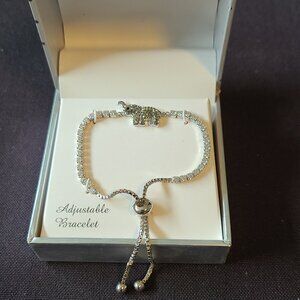 NWT Adjustable clear rhinestone bracelete w/ Elephant charm.
